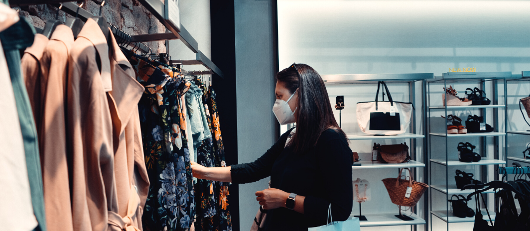 Woman in mask shopping